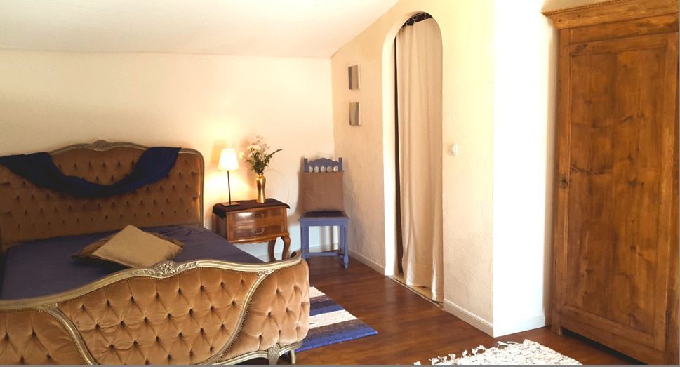 La chambre Oiseau et son lit capitonné